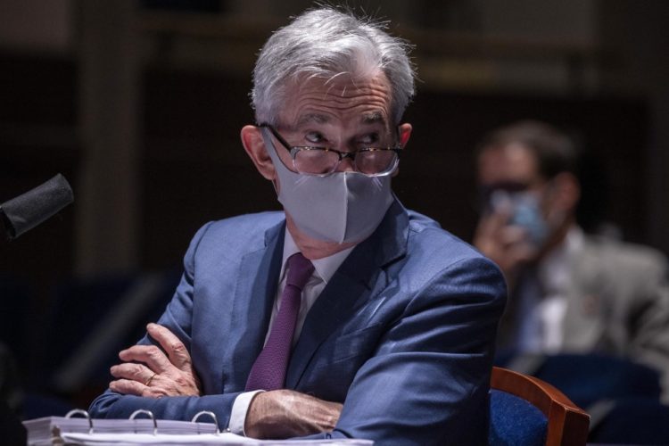 Wearing masks, social-distancing could lead to "enormous economic gains": US Fed chief