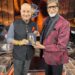 Anupam Kher gifts his latest book to Amitabh Bachchan