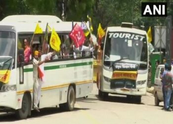 After 8 months at Delhi's border protesting farmers gather near Parliament