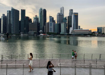 Singapore reports 1,650 new COVID-19 cases, says hospital resources under serious strain