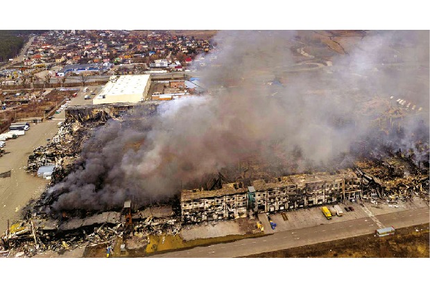 Russia halts strikes for evacuations but battles continue