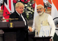 Modi congratulates Johnson for successfully organising COP 26 last year