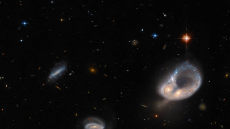 Hubble captures unusual galaxy merger in ancient universe