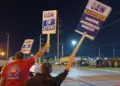 Over 13,000 workers at three US auto plants strike work that could hit US economy