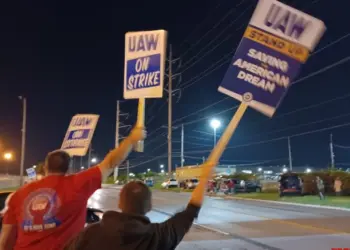 Over 13,000 workers at three US auto plants strike work that could hit US economy