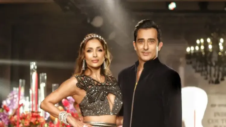 FDCI Couture Week: Malaika dazzles in Siddartha Tytler’s black & golden lehenga