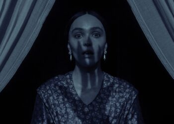 In Robert Eggers’ ‘Nosferatu,’ a newly married Ellen Hutter bids goodbye to her husband, Thomas, when he is sent away on his first assign